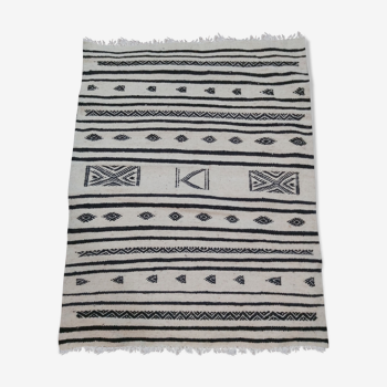 Traditional handmade white and black kilim carpet