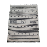 Traditional handmade white and black kilim carpet