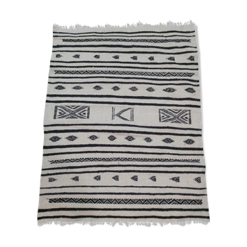 Traditional handmade white and black kilim carpet