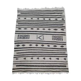 Traditional handmade white and black kilim carpet