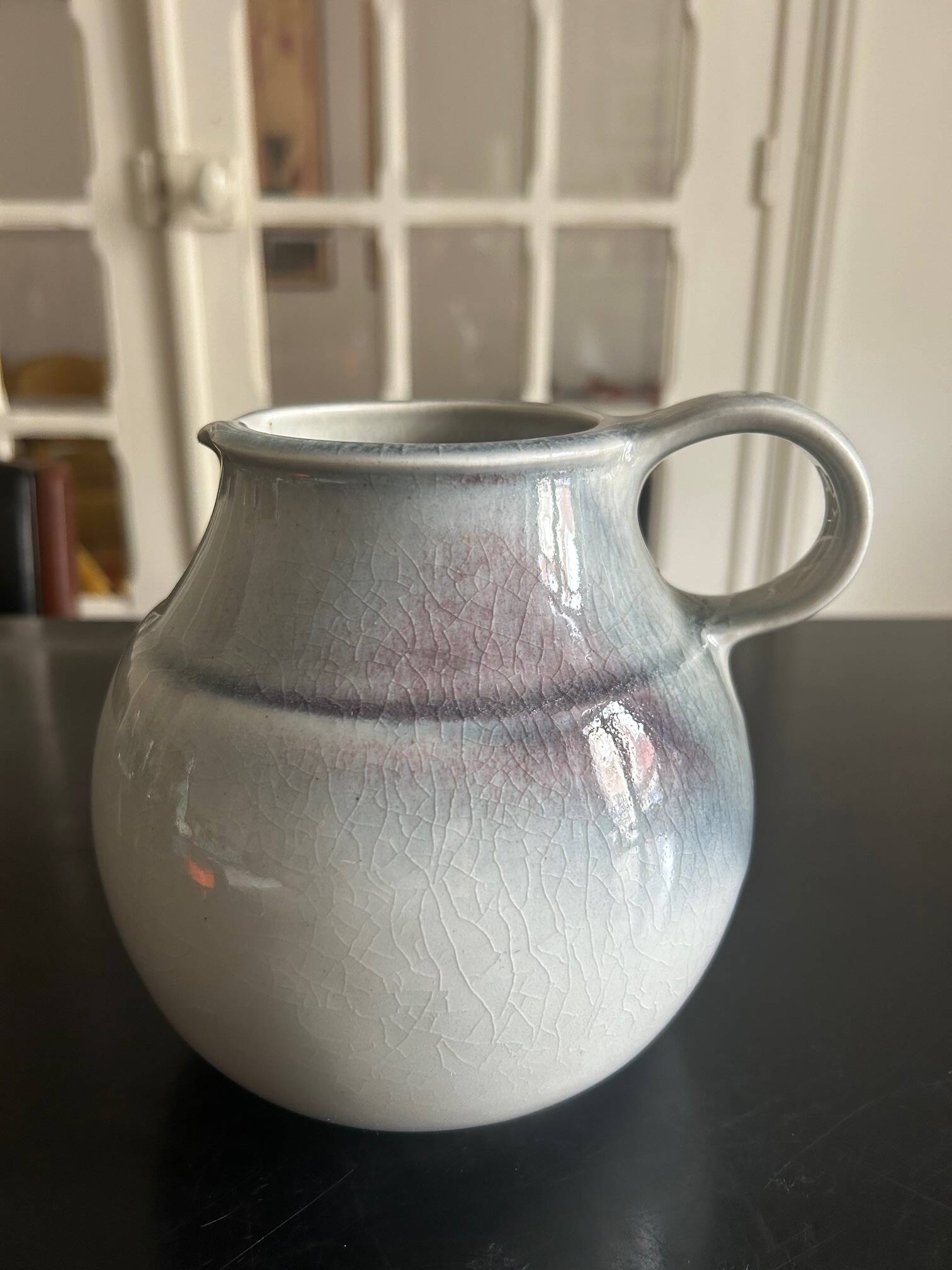 large blue ceramic pitcher
