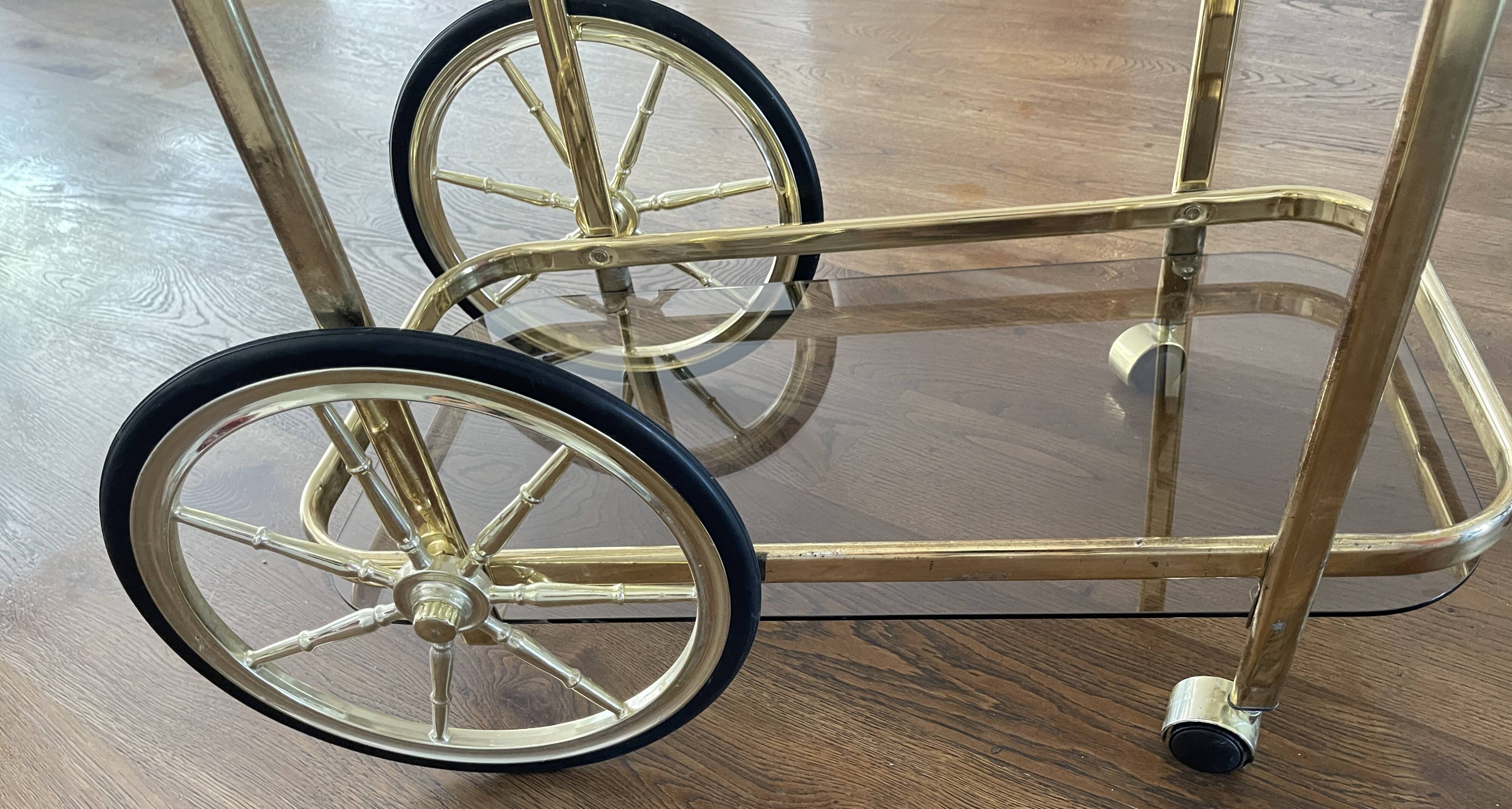 Brass and smoked glass bar trolley, 2 trays