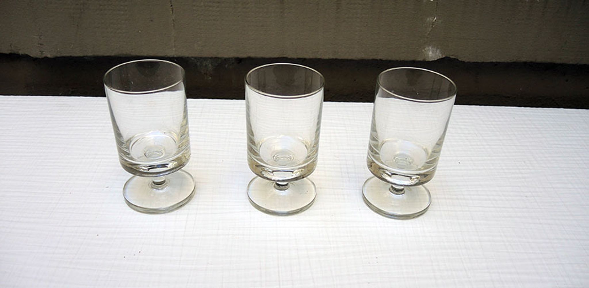 3 old transparent glass foot glasses