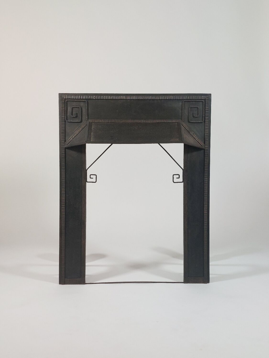 Hand-forged spiral decorative fire surround.