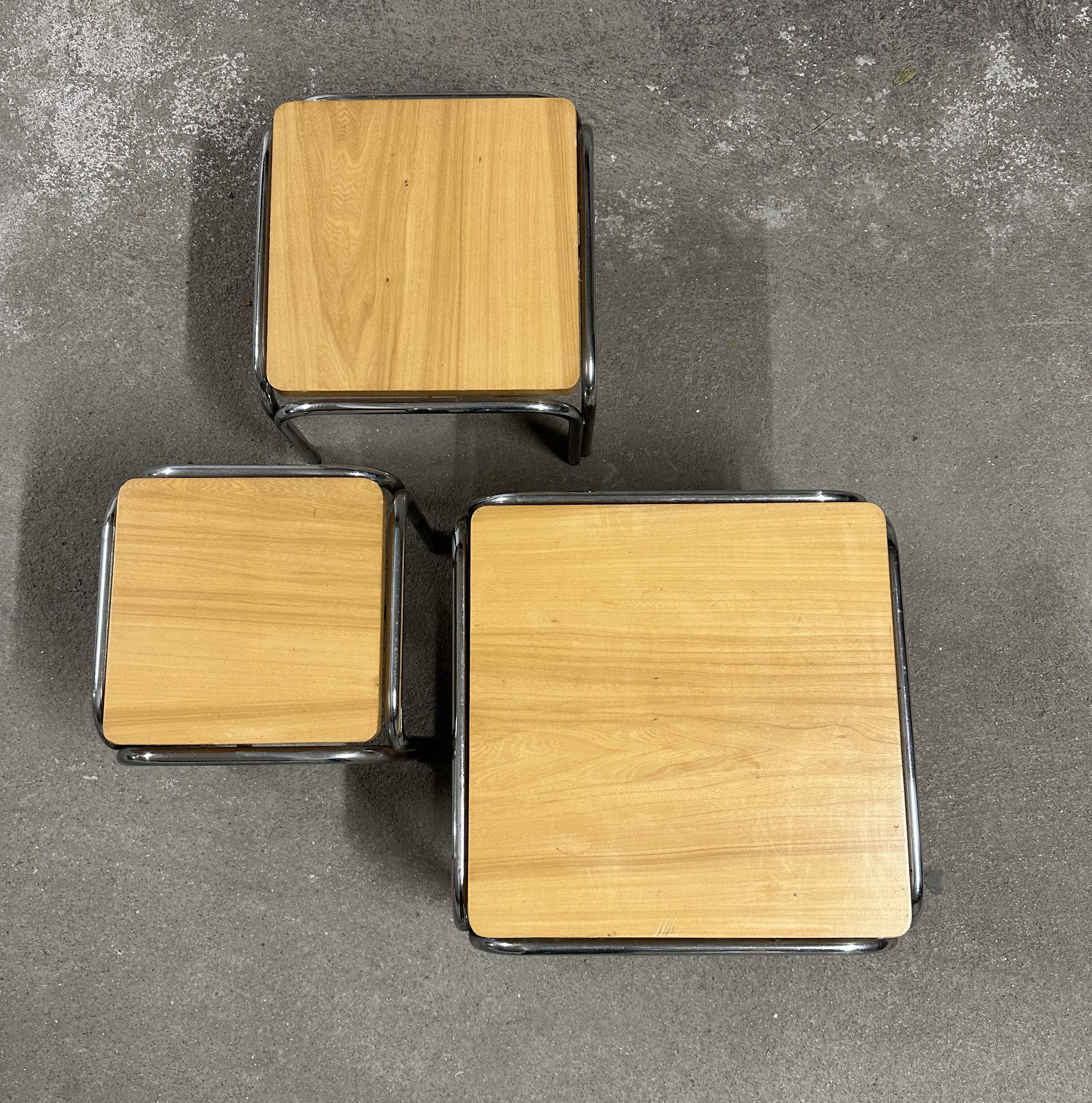 Set of 4 nesting coffee tables from the 70s, metal and solid oak.