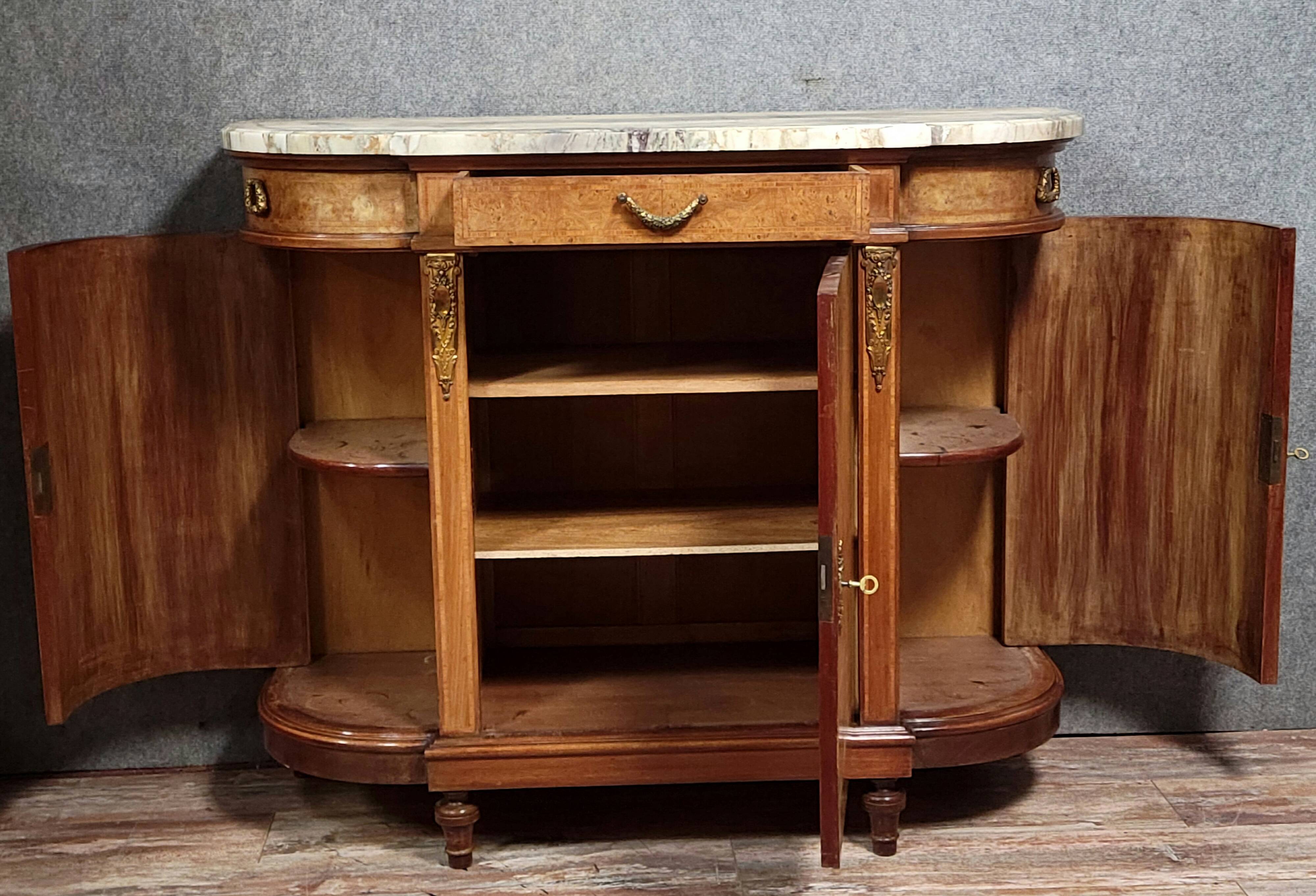 Half-moon buffet in Louis XVI style with burl and marquetry.