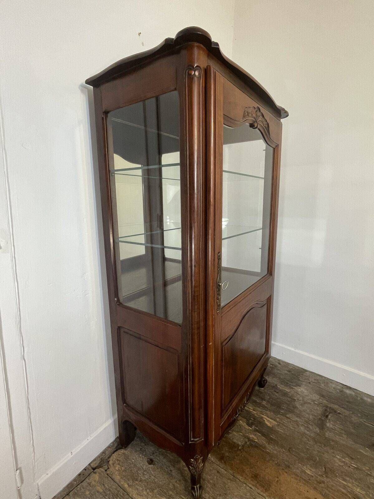 Provençal Louis XV display cabinet in carved fruitwood, illuminated.