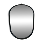 Oval mirror from the 1950s, wrought iron and brass.