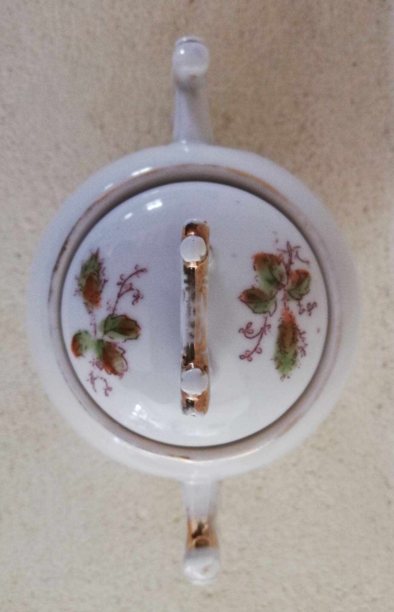 Porcelain sugar bowl handle decorated with sugar cane