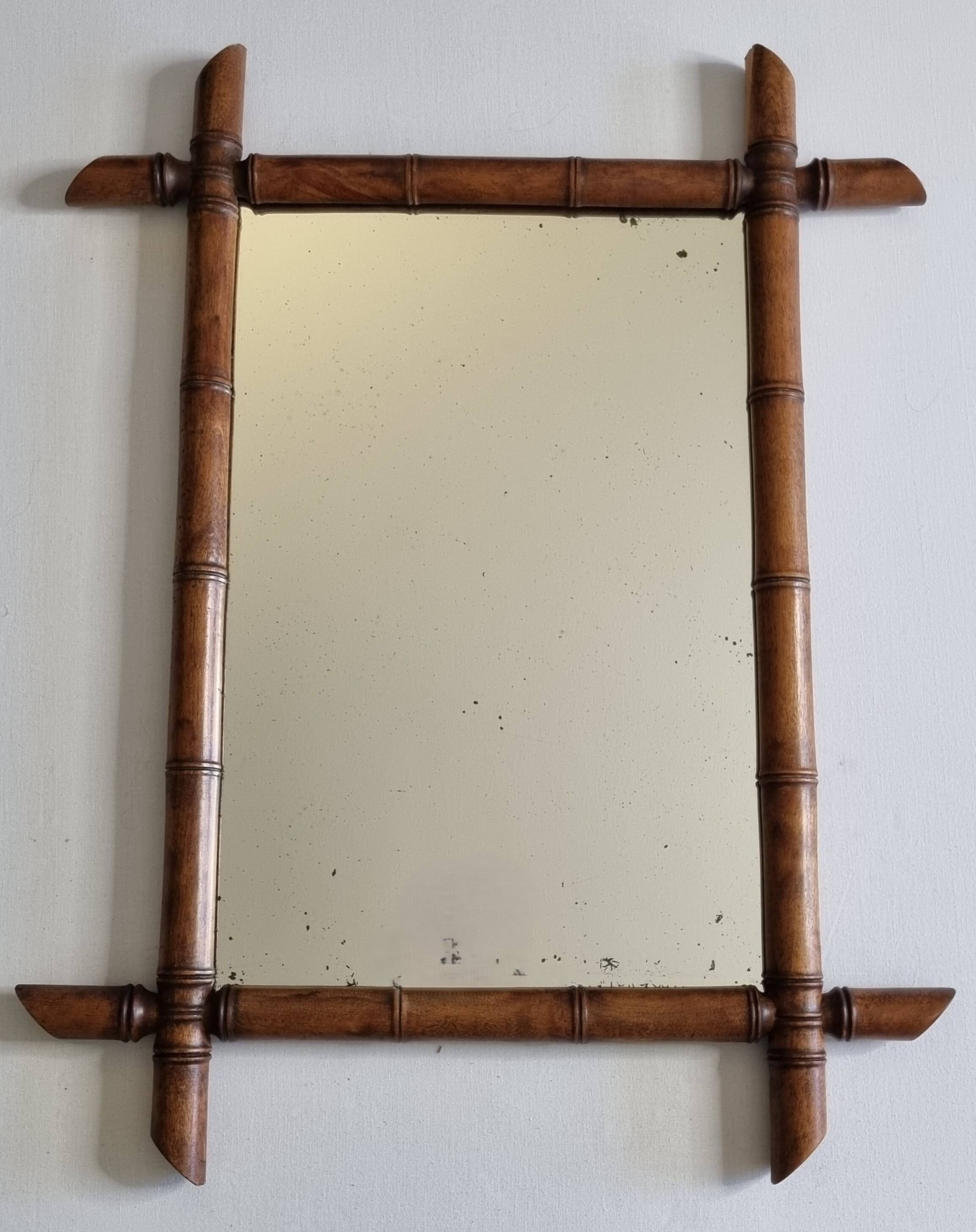 Miroir mural Napoléon III en bois tourné façon bambou XIXe siècle, 49x65 cm