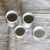 4 mismatched vintage white porcelain egg cups