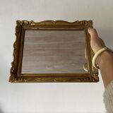 Small molded gilded mirror
