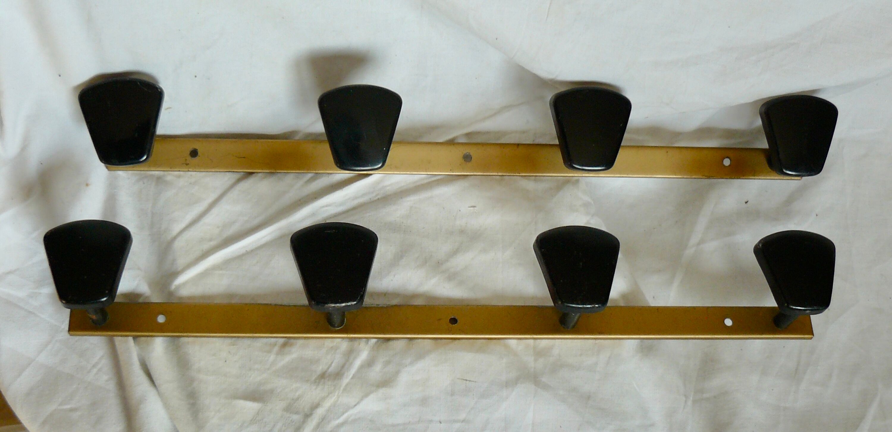 Pair of vintage metal coat racks