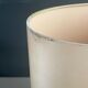 Ceramic floor lamp with a silk shade, signed.
