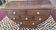 Half-moon commode
