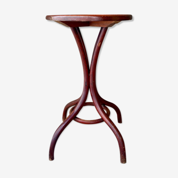 Pedestal table in curved wood