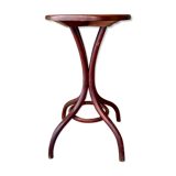 Pedestal table in curved wood