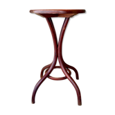 Pedestal table in curved wood