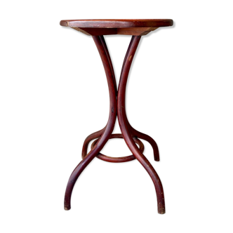 Pedestal table in curved wood