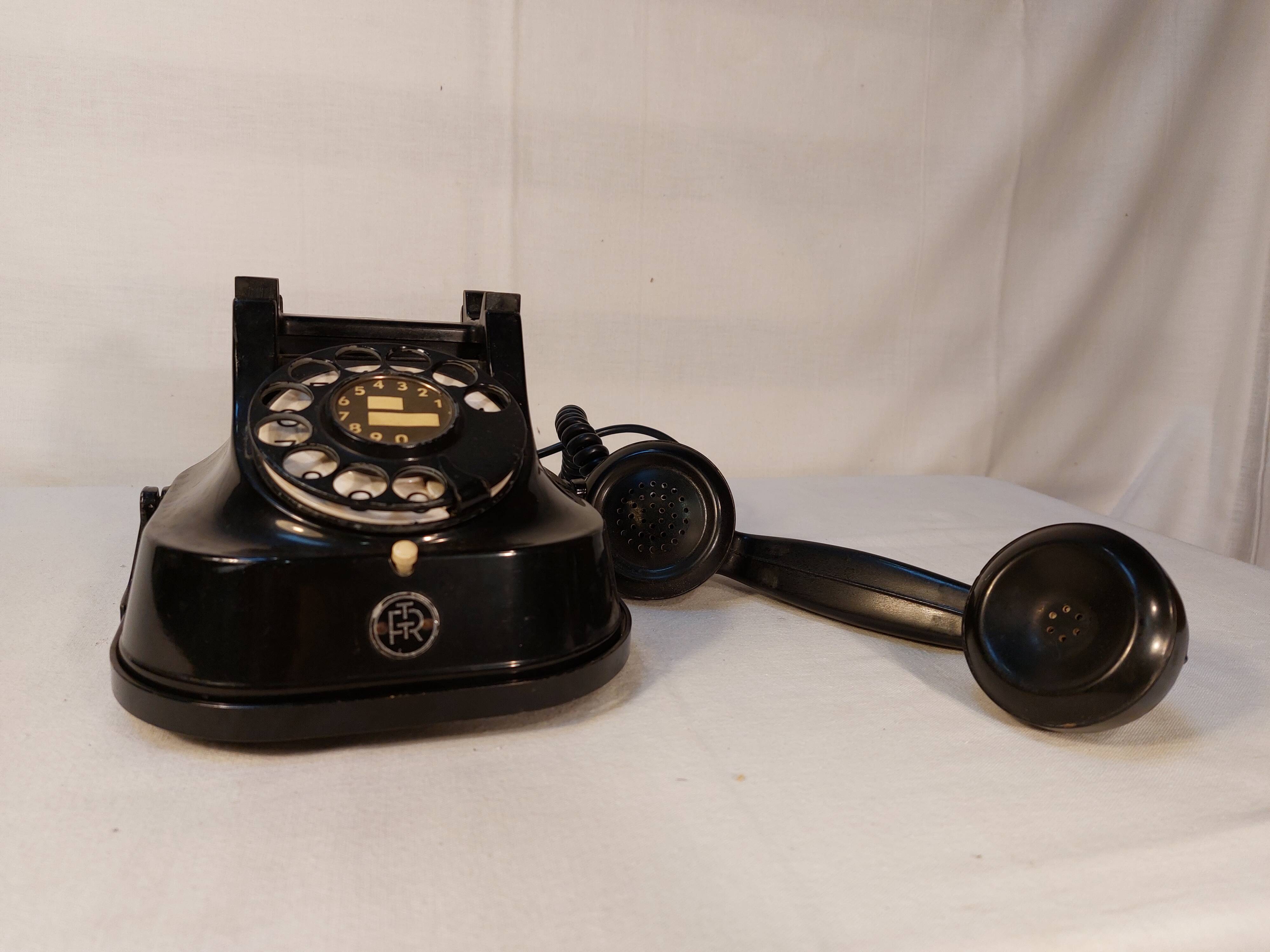 Old Belgian RTT 56B dial telephone in black bakelite