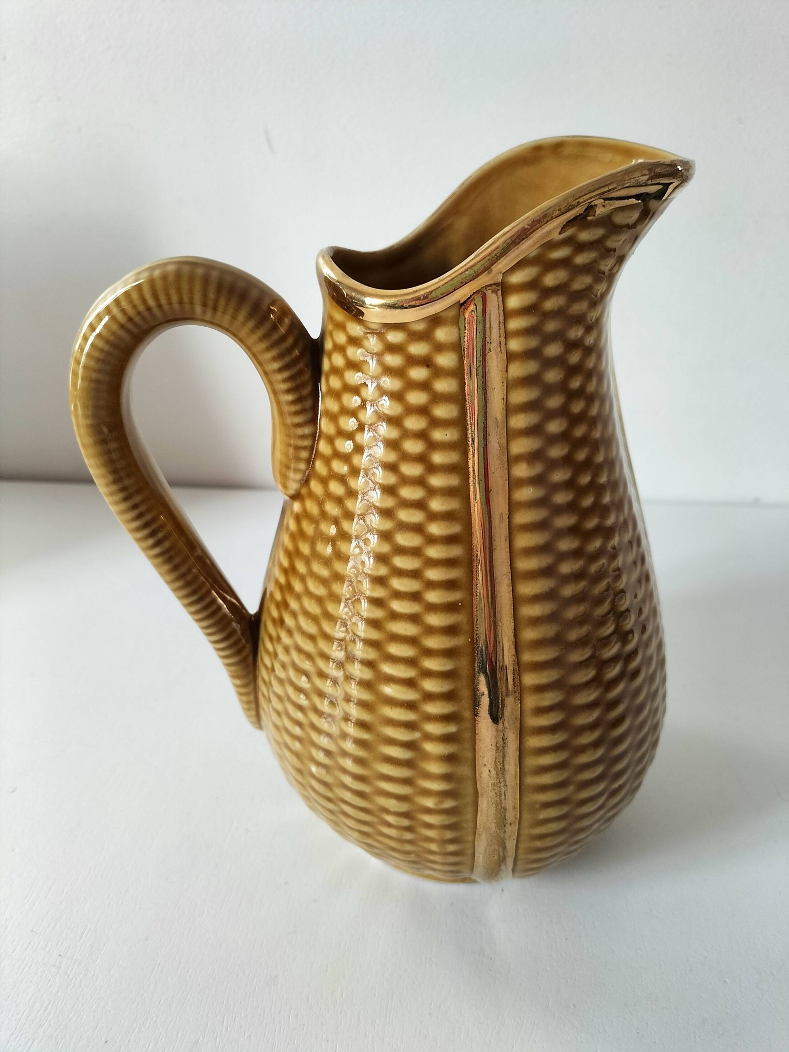 Corn cob slipware jug – gilded highlights