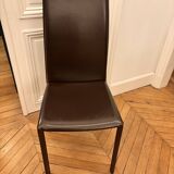 Many brown leather chairs "Roche Bobois"