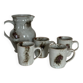 Signed stoneware pitcher and cups