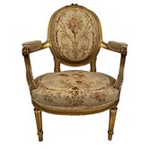 Fauteuil en bois doré de style Louis XVI, fin XIXe ou début XXe