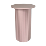 round and fluted bedside table in dusty pink