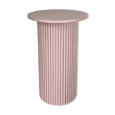 round and fluted bedside table in dusty pink