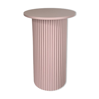 round and fluted bedside table in dusty pink