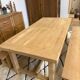 Solid oak extendable farmhouse table with 2 drawers.