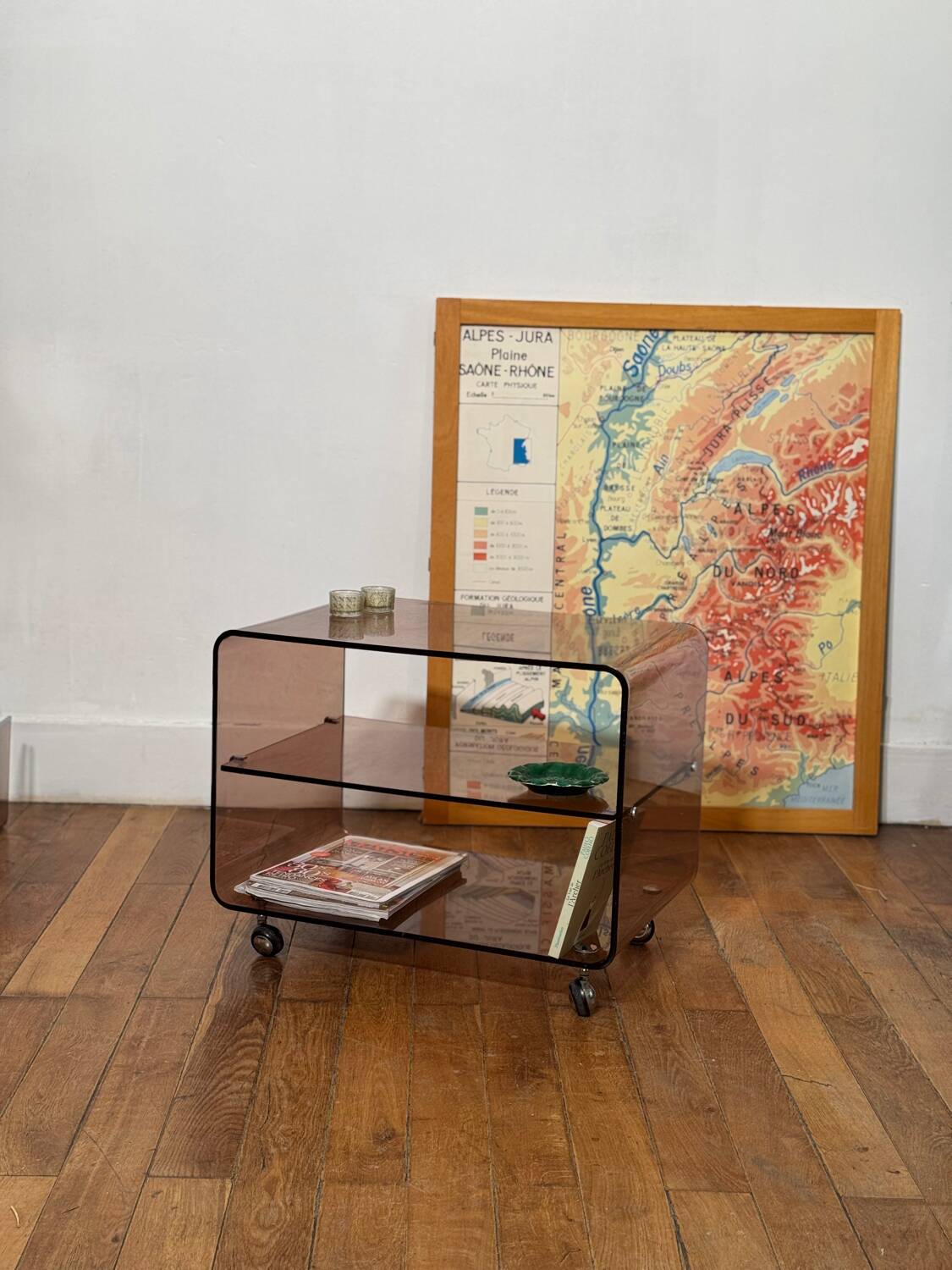 Smoked Plexiglas coffee table on wheels -
