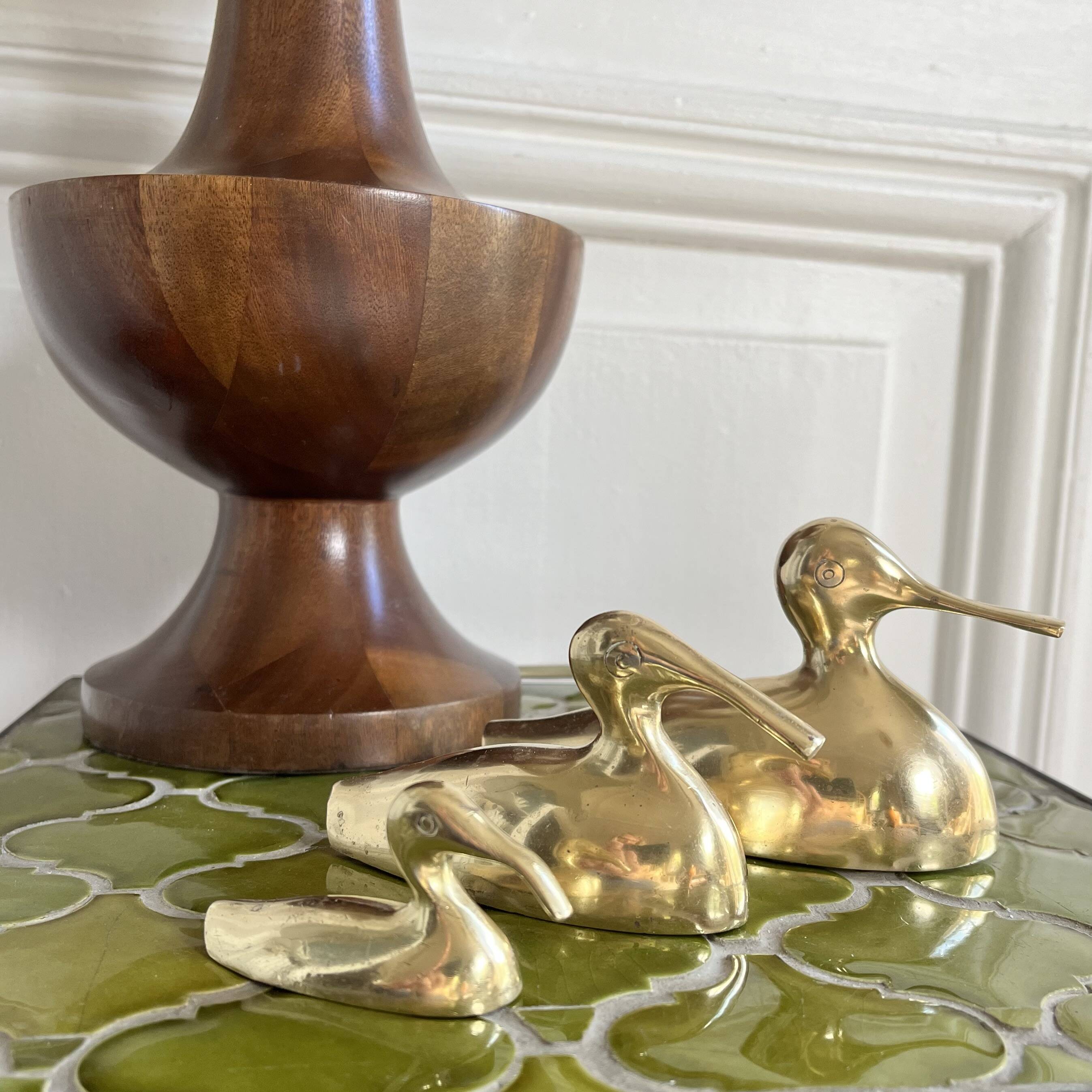 Three brass ducks from the 1950s