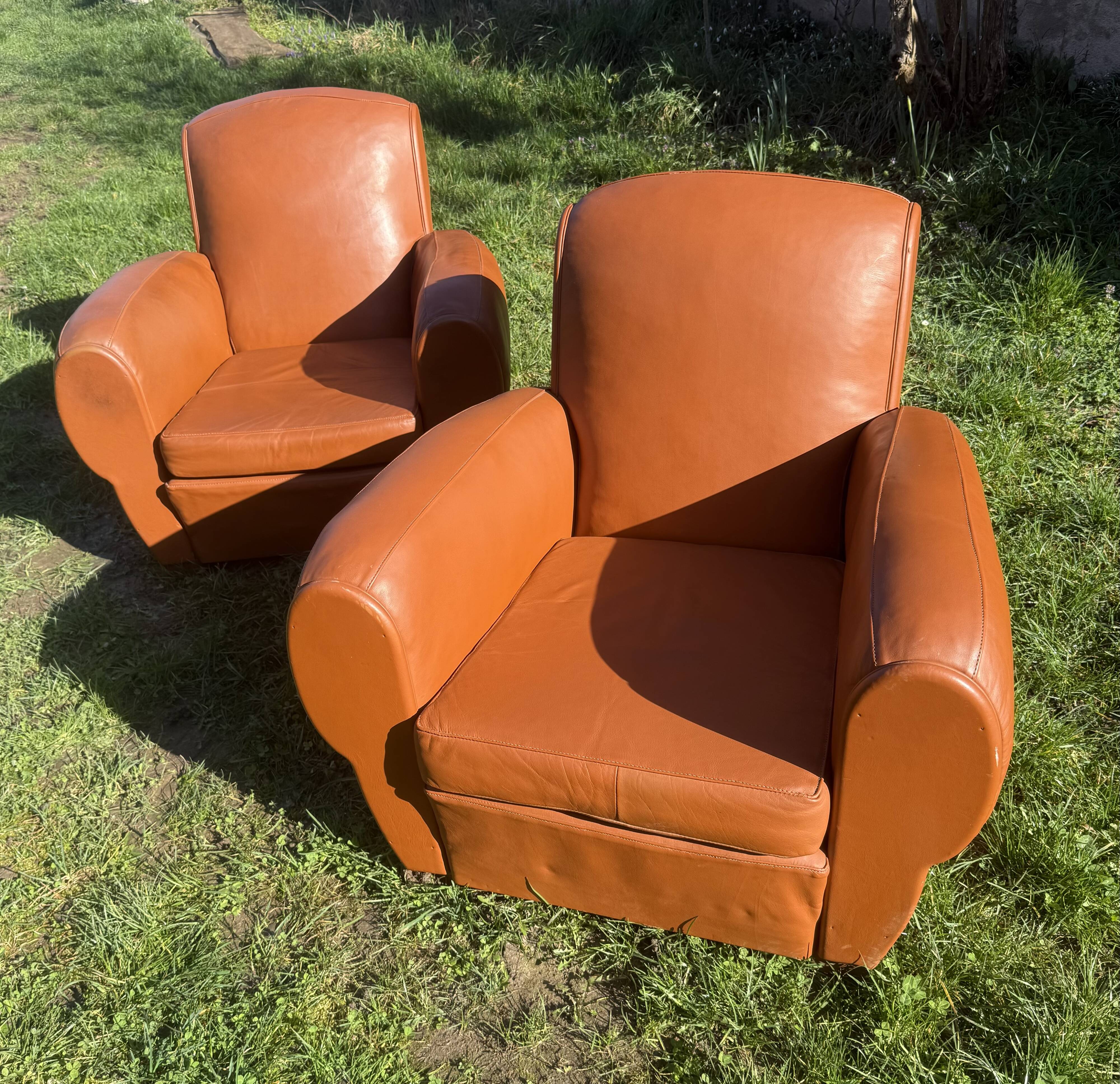 pair of leather clubs