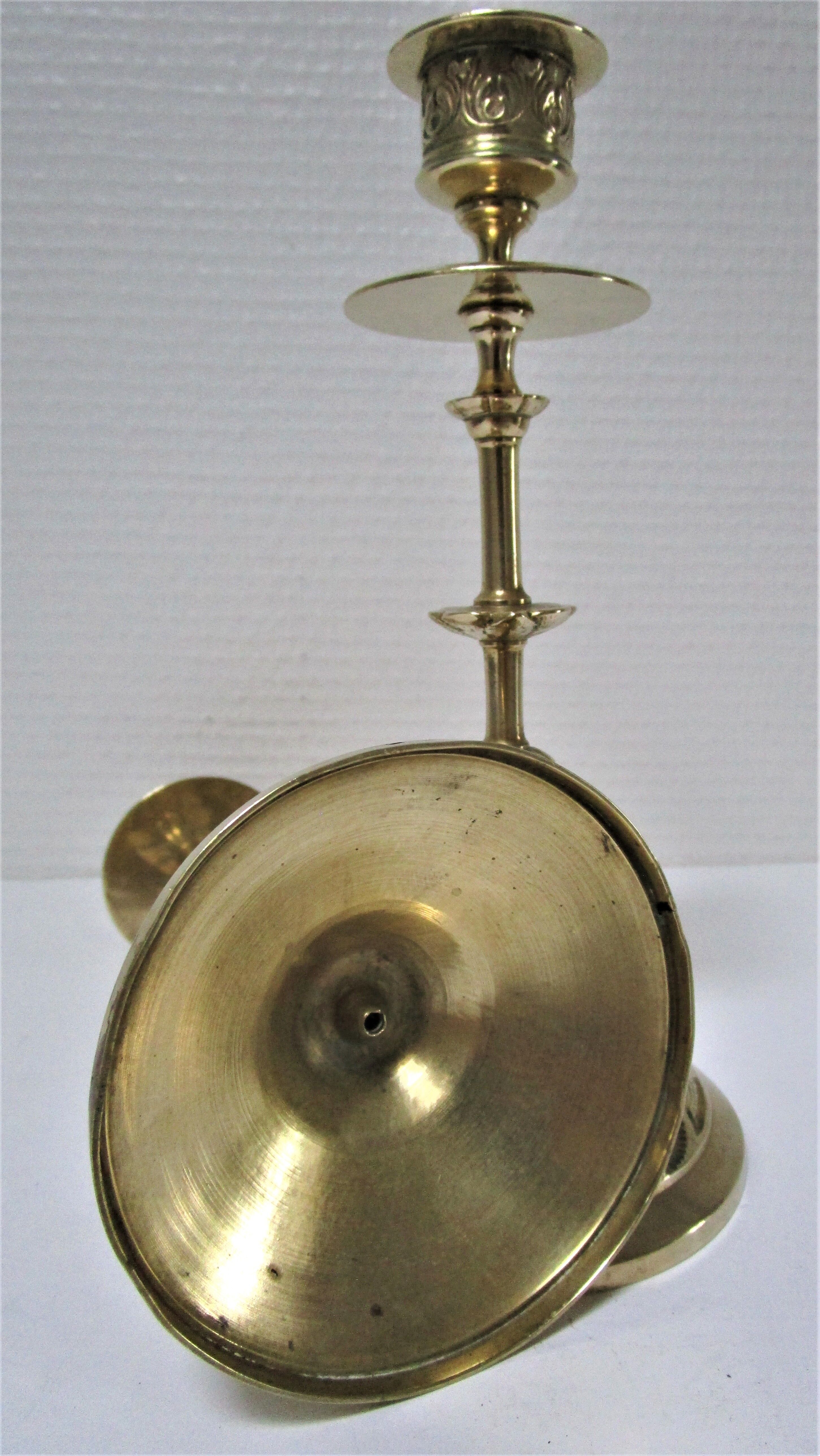 Pair of vintage brass candlesticks decorated with flowers