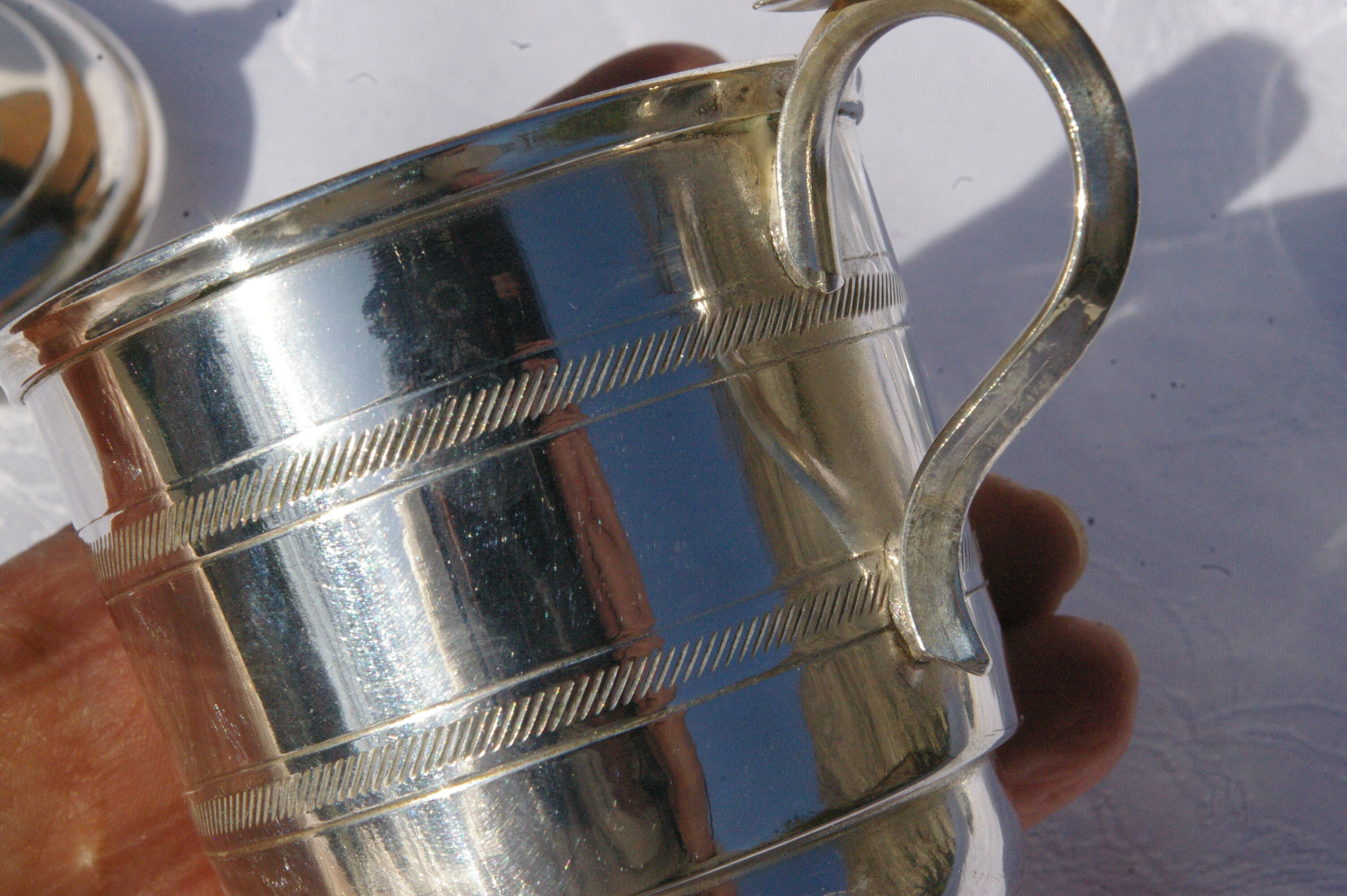 Tisher cup in silver metal and glass