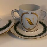 Porcelain cup of snake in the colors of Napoleon with its saucer and lid