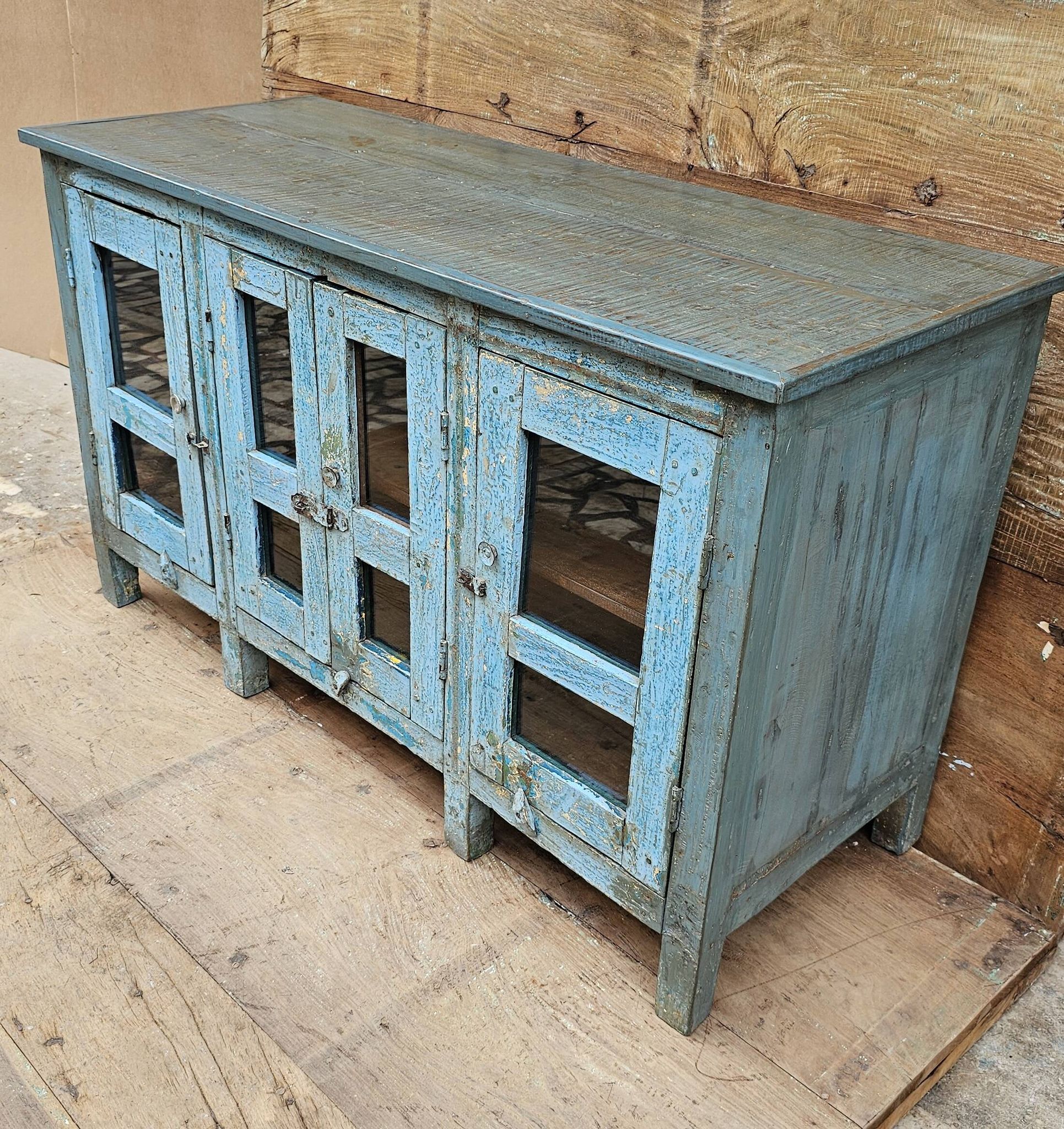 Antique glass-fronted buffet in Burmese teak