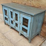 Antique glass-fronted buffet in Burmese teak