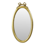 Miroir ovale classique doré à décor de ruban, France