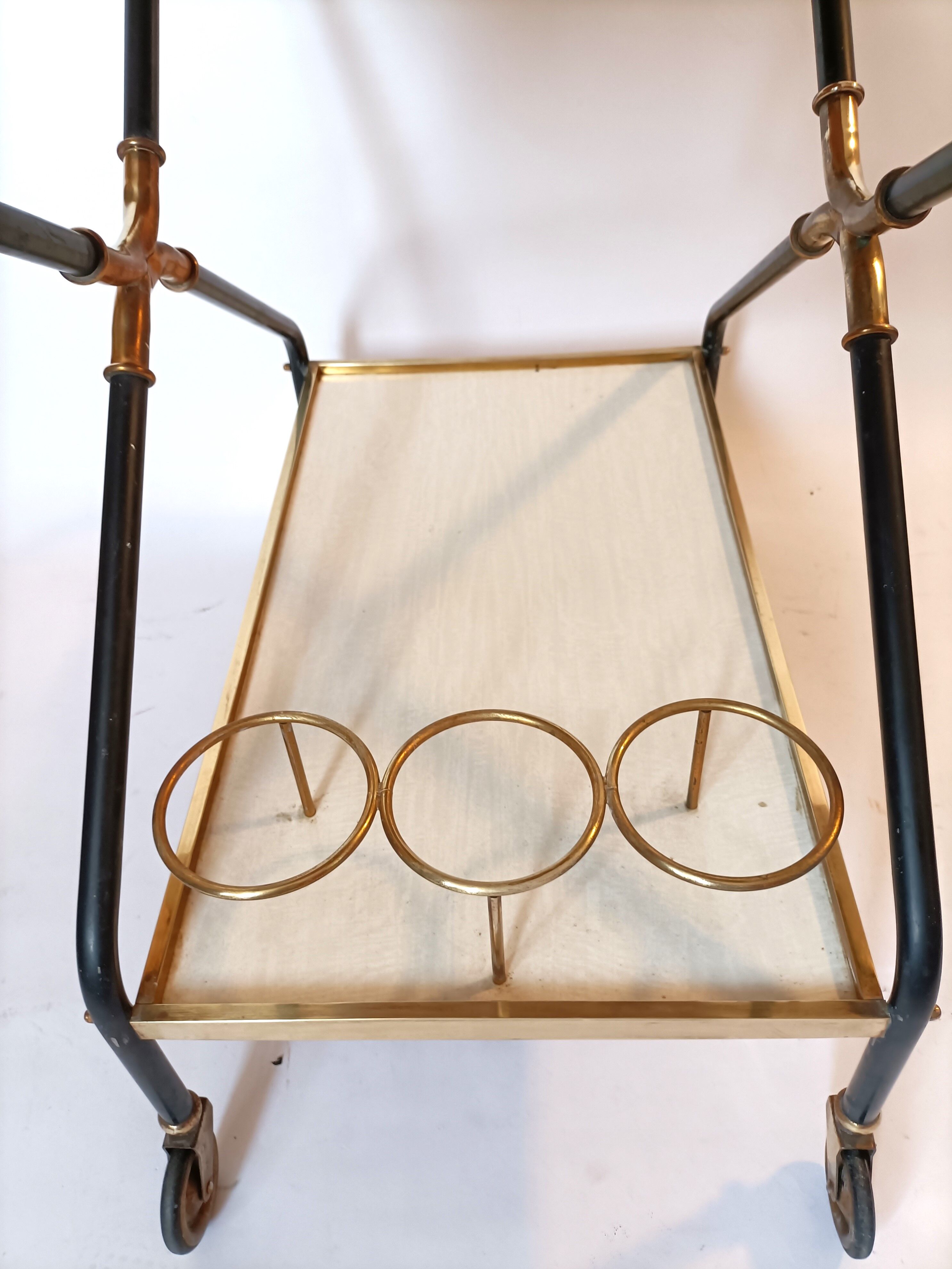 Rolling bar in gilded brass and black metal, Italy circa 1950