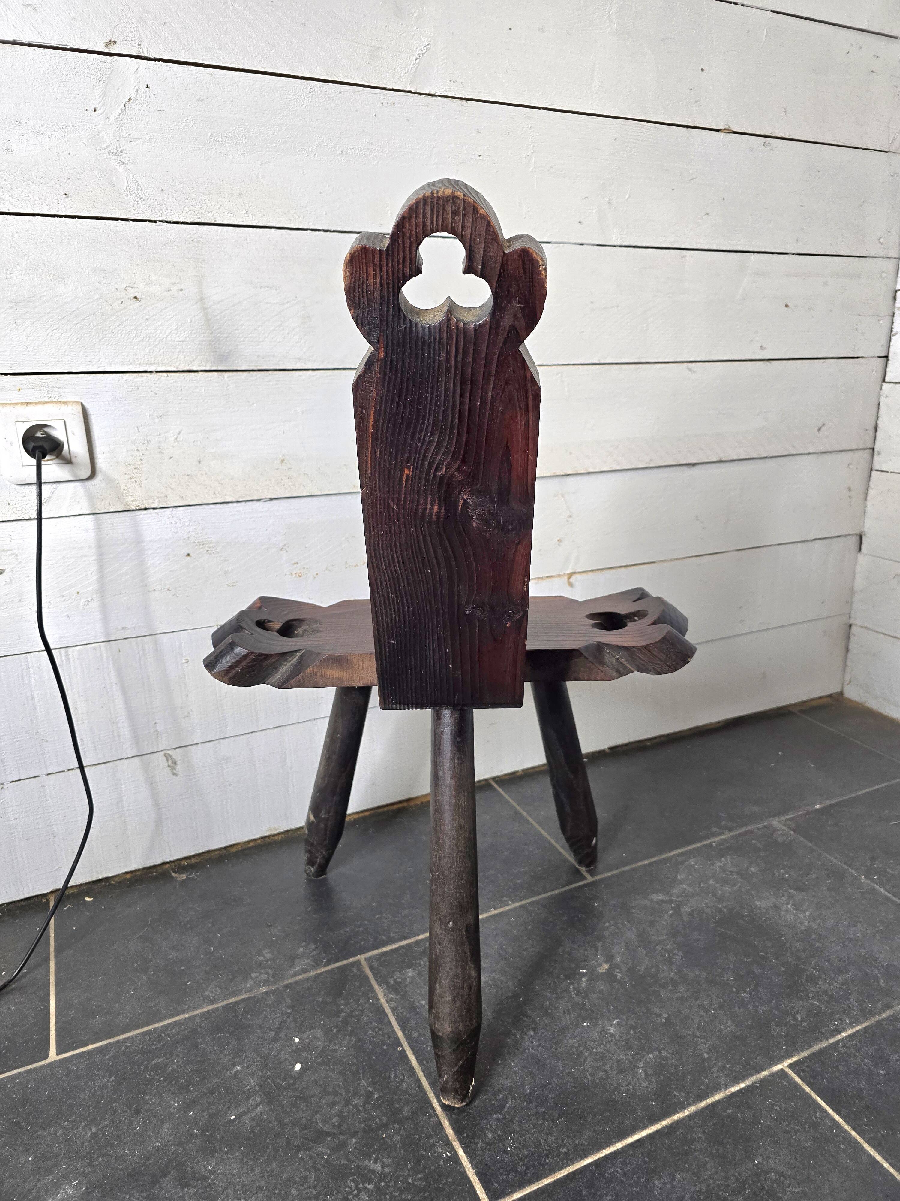 Vintage Spanish tripod chair in carved wood