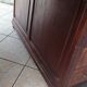 Vintage double-sided mahogany desk with 18 drawers.