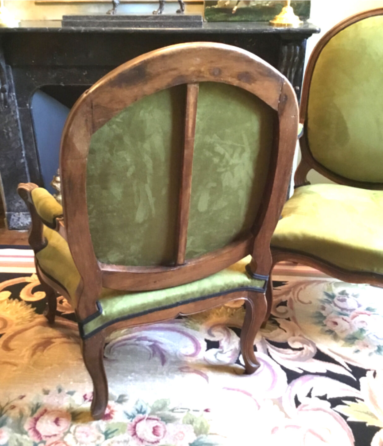 Pair of wide Louis XV armchairs reupholstered to new.