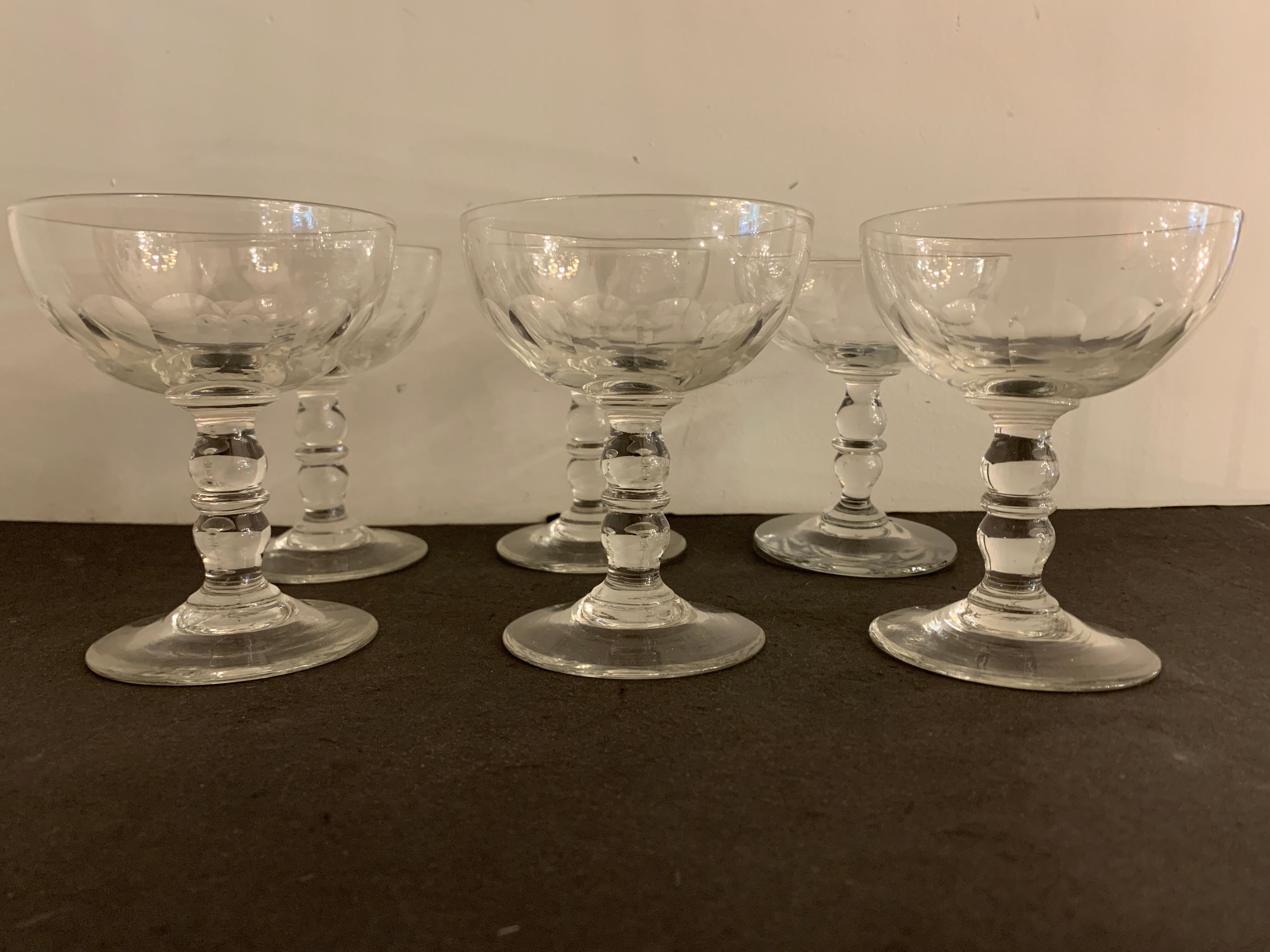 6 old champagne cups in faceted glass