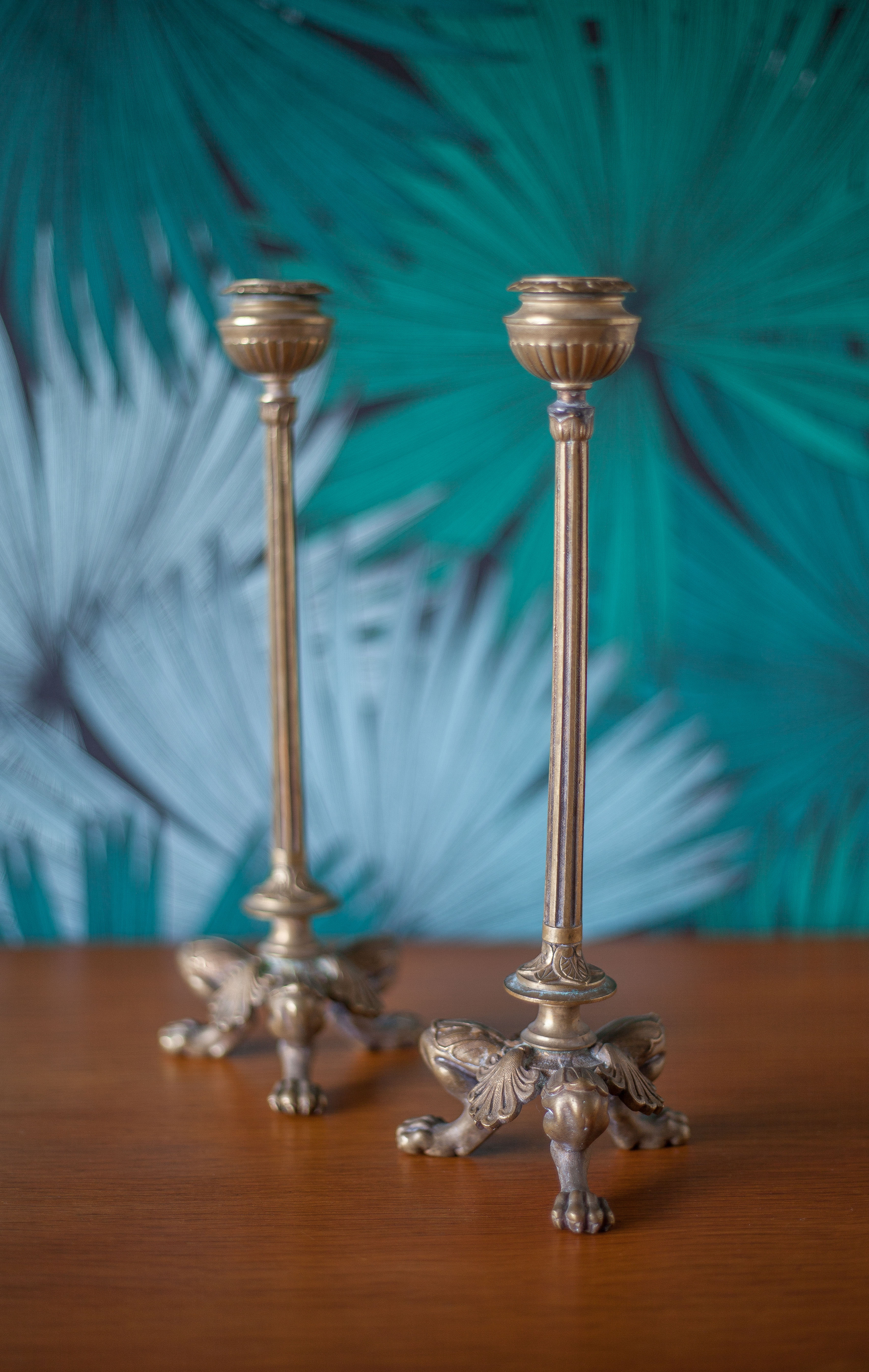 pair of numbered bronze candle holder