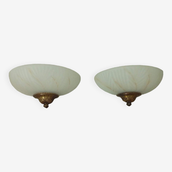Pair of wall sconces in glass paste and brass