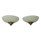 Pair of wall sconces in glass paste and brass
