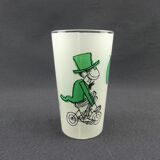 Glass illustrated by Cabu on the theme of the circus, 3 learned monkeys on a bike, green